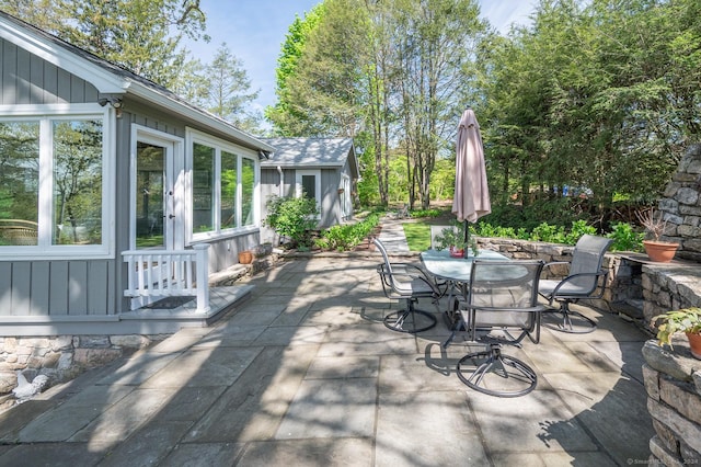 view of patio with outdoor dining area