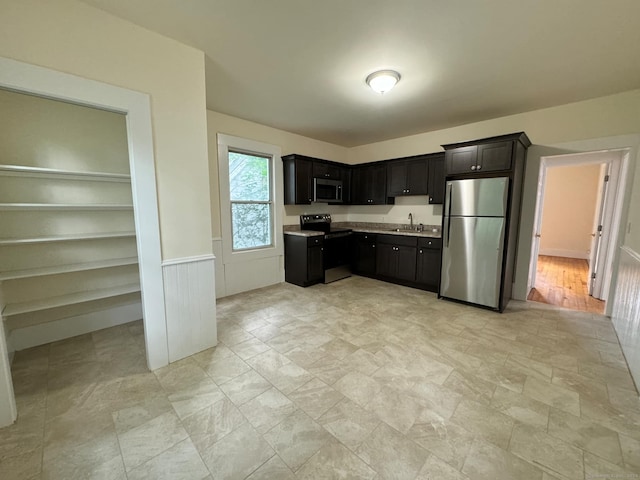 kitchen featuring sink and appliances with stainless steel finishes