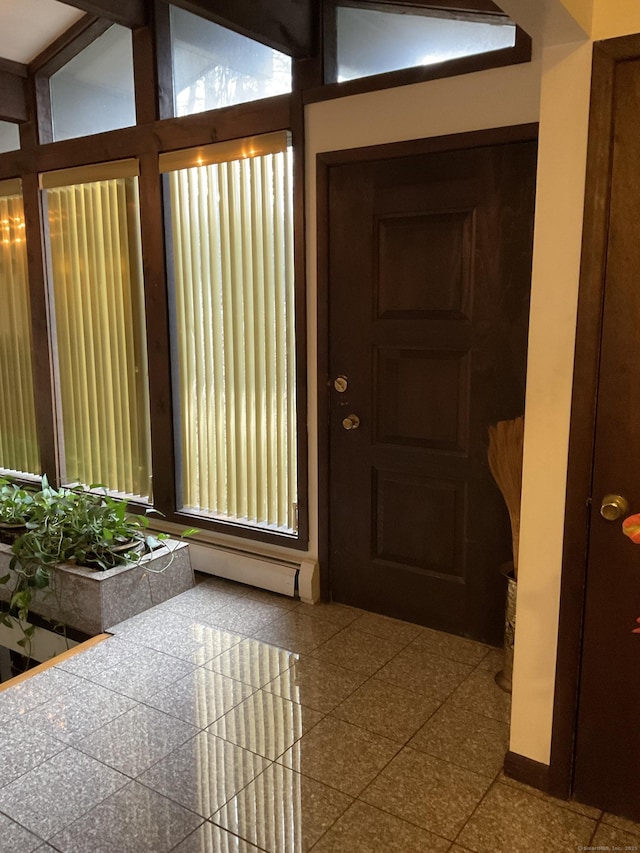 entryway with vaulted ceiling