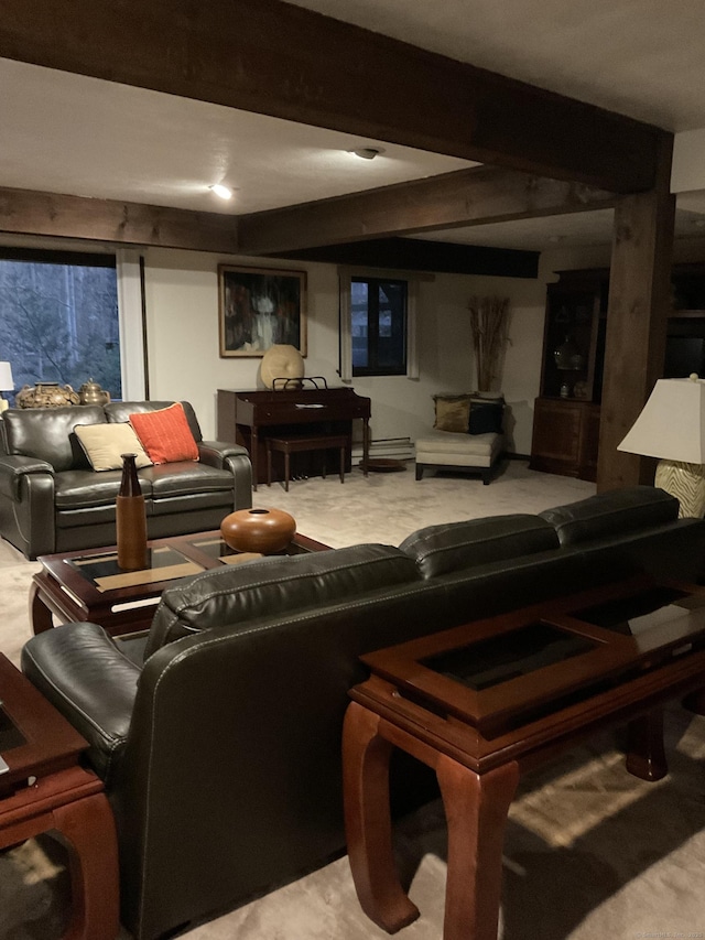 carpeted living room featuring beamed ceiling