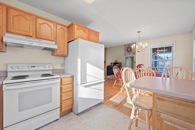 kitchen with white appliances, hanging light fixtures, light hardwood / wood-style flooring, light brown cabinetry, and a chandelier