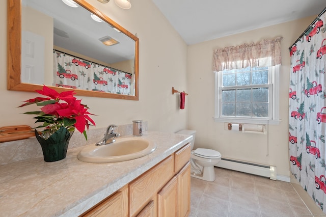 bathroom with vanity, a baseboard radiator, and toilet