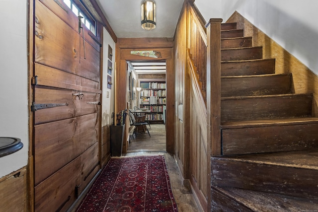 interior space featuring wooden walls