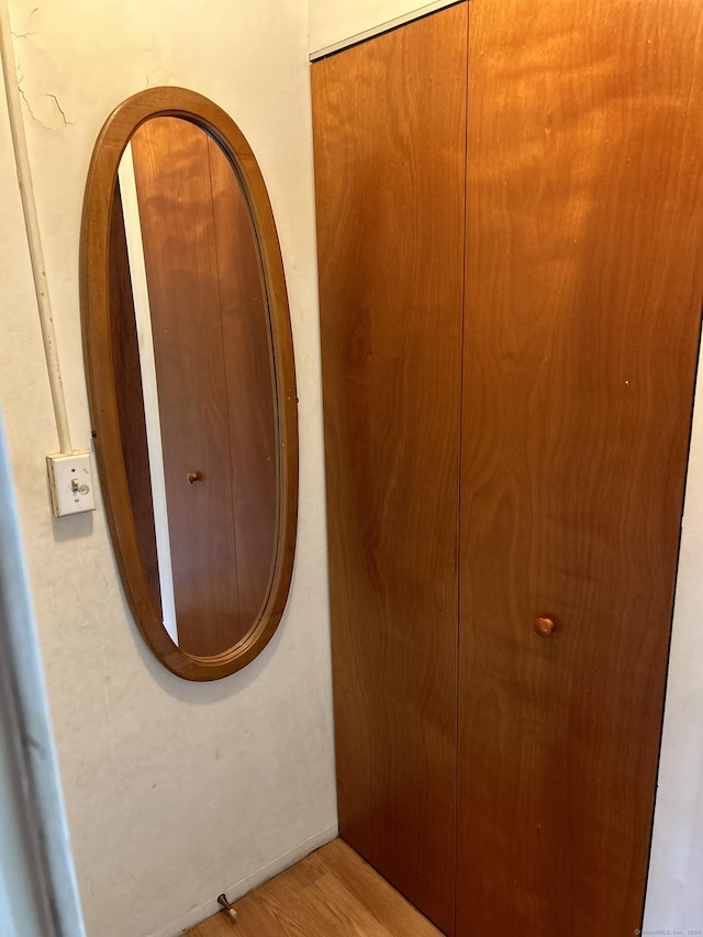 519BDLG-53 Success Ave Unit 519, Bridgeport, CT 06610 - detailed view of wood finished floors and arched walkways