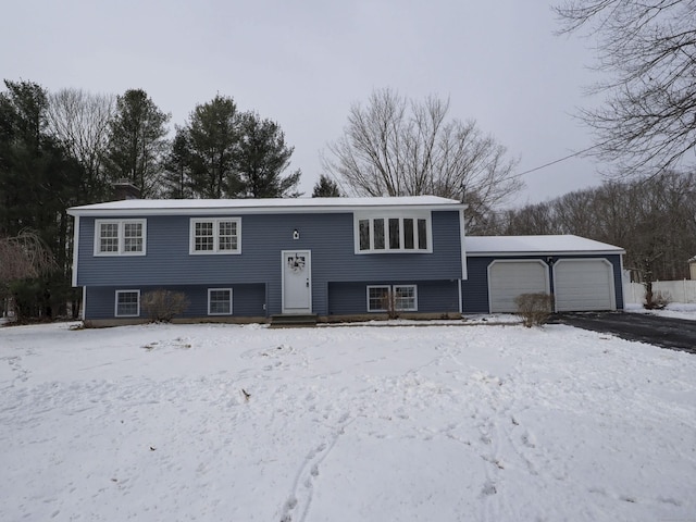 split foyer home featuring a garage