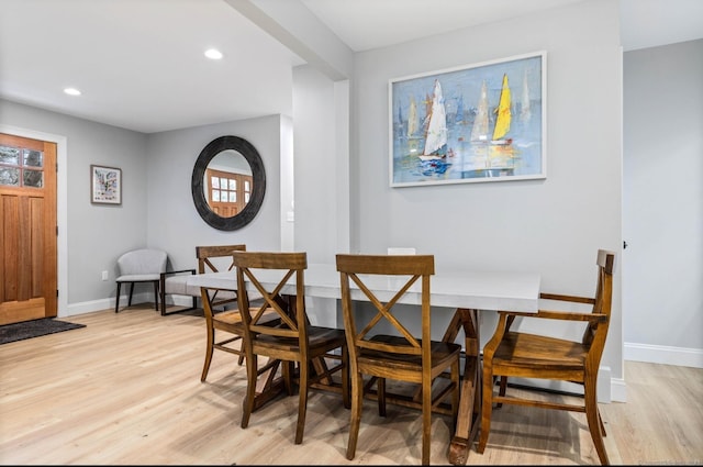 dining room with light wood-type flooring