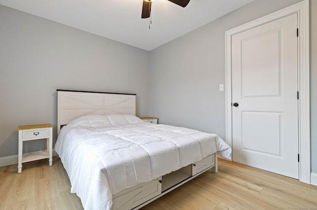 bedroom featuring ceiling fan and light wood-type flooring