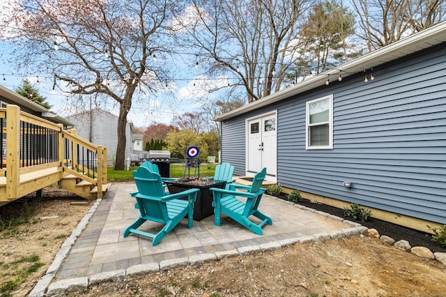 view of patio / terrace featuring a wooden deck