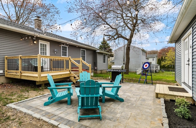 view of patio / terrace with a deck and grilling area