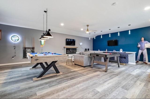 playroom with hardwood / wood-style floors, ceiling fan, and pool table