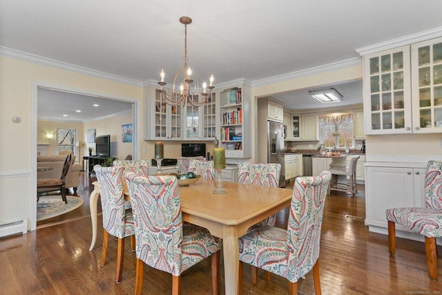 dining space with a wealth of natural light, crown molding, a chandelier, and dark hardwood / wood-style floors