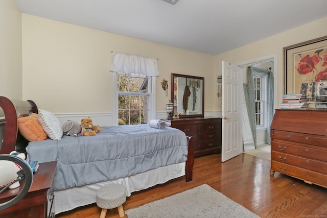 bedroom featuring dark hardwood / wood-style flooring