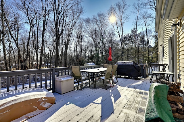 wooden deck with grilling area