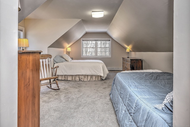 bedroom featuring baseboard heating, carpet floors, and vaulted ceiling