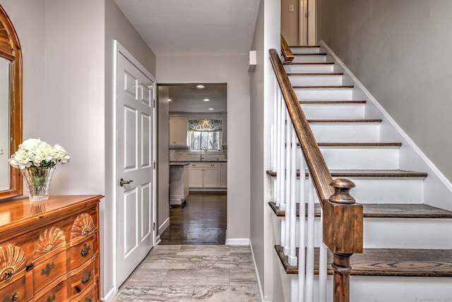 staircase with sink