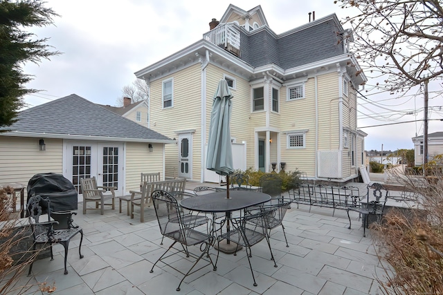 view of patio with a balcony