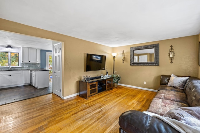 8 Fernwood Ave, Enfield, CT 06082 - living area with light wood-style flooring