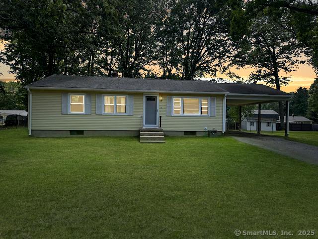 8 Fernwood Ave, Enfield, CT 06082 - view of front of property featuring entry steps, a carport, driveway, and a front yard