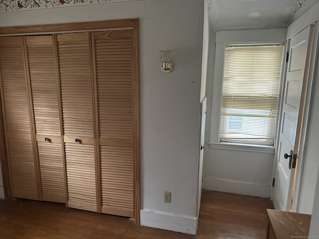 interior space with hardwood / wood-style flooring