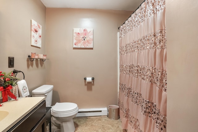 bathroom with vanity, a baseboard radiator, and toilet