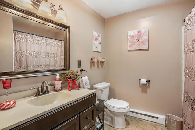 bathroom with tile patterned floors, vanity, a baseboard radiator, and toilet