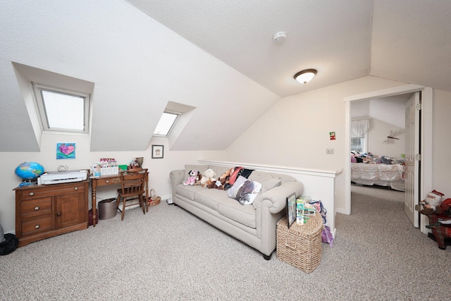 carpeted office featuring vaulted ceiling