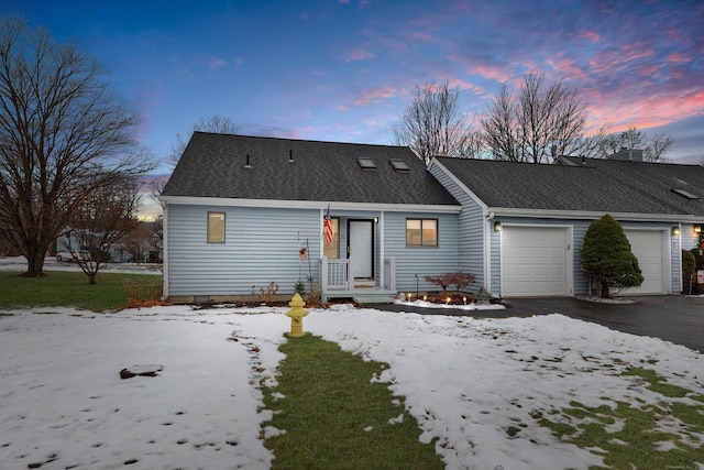 ranch-style home with a garage