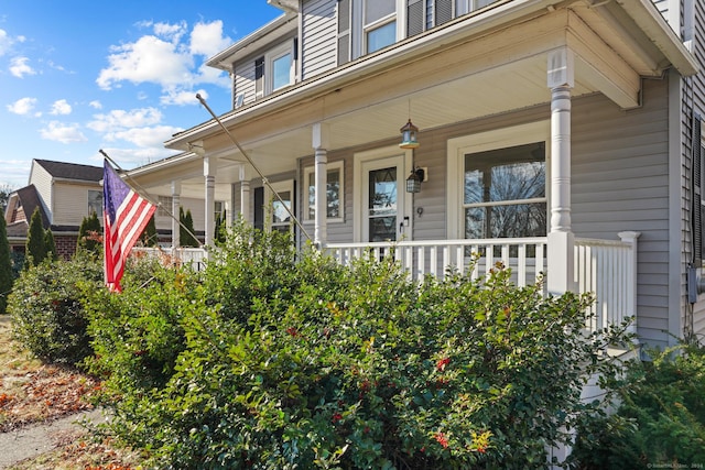 doorway to property with covered porch