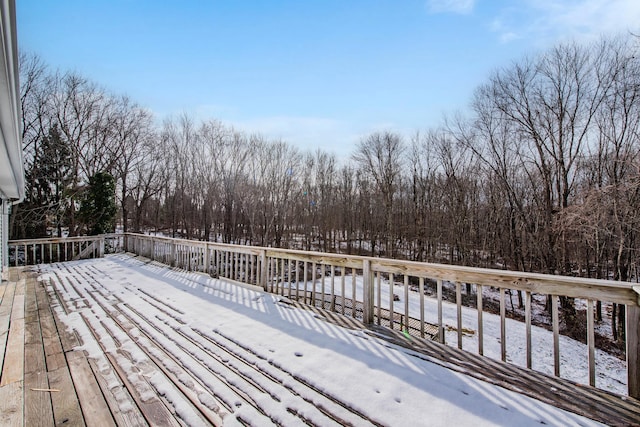 view of snow covered deck