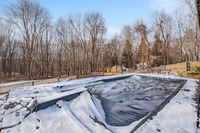 view of snow covered pool