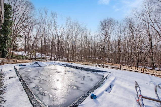 view of yard layered in snow