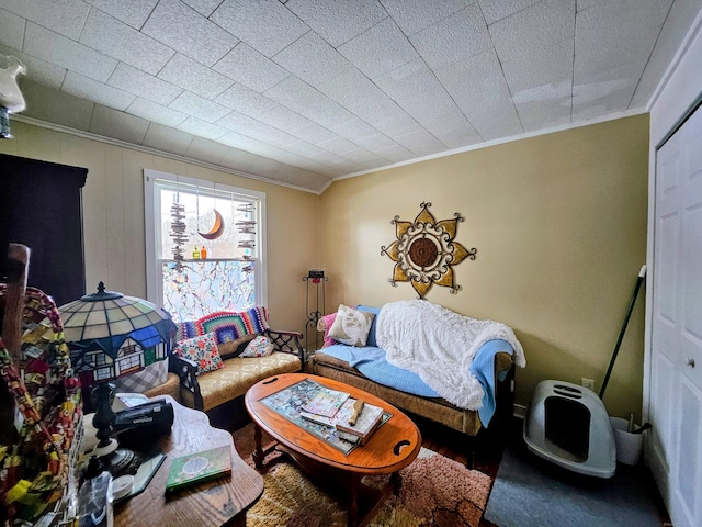 living room featuring crown molding