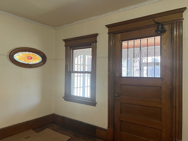 entryway featuring ornamental molding