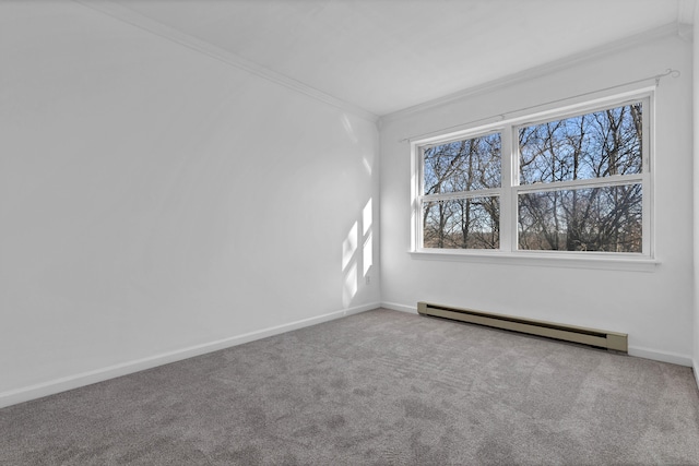 carpeted spare room with crown molding and baseboard heating