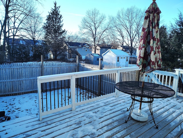 view of snow covered deck