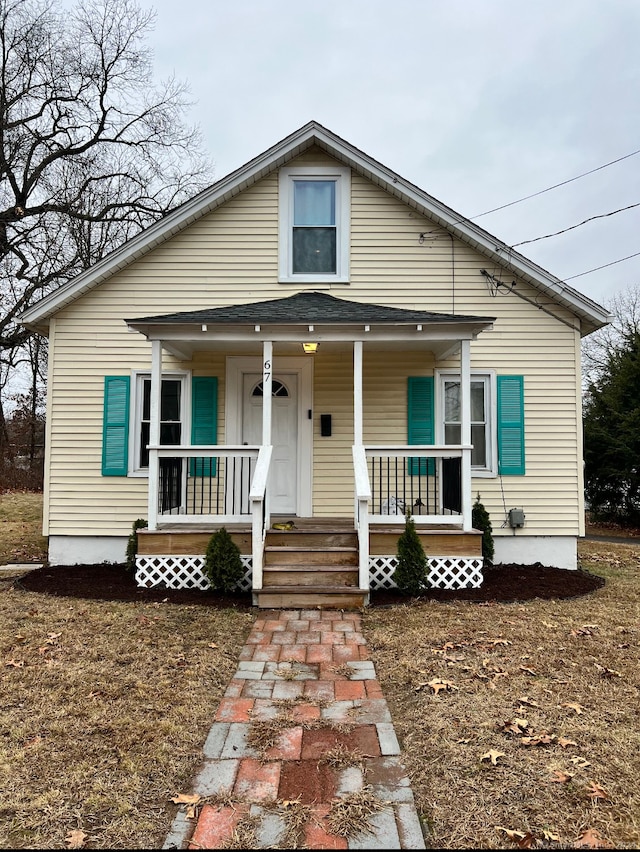 bungalow-style home with a porch