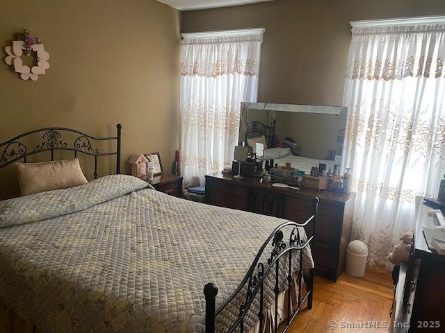 bedroom with parquet floors