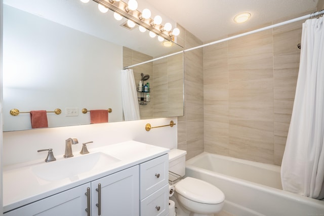 full bathroom featuring vanity, toilet, and shower / tub combo with curtain