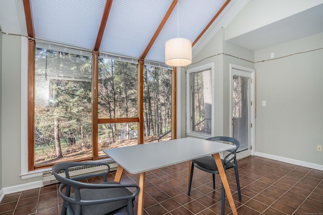 sunroom / solarium with a baseboard radiator and lofted ceiling