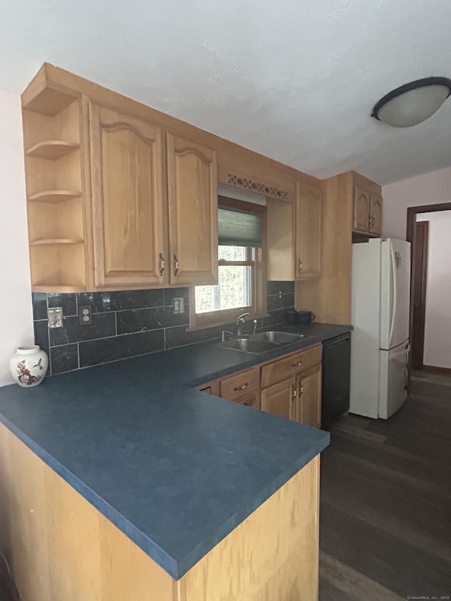 kitchen featuring dark hardwood / wood-style floors, black dishwasher, sink, white fridge, and light brown cabinets