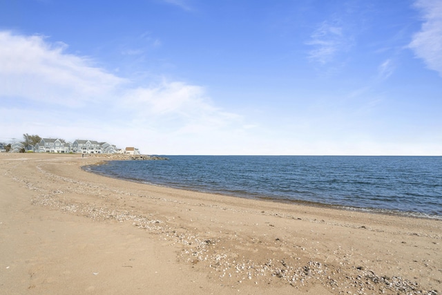 view of water feature with a beach view