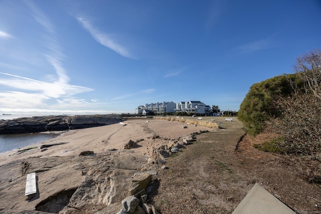 exterior space with a water view