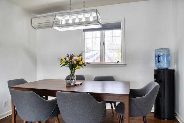 dining area featuring dark hardwood / wood-style flooring