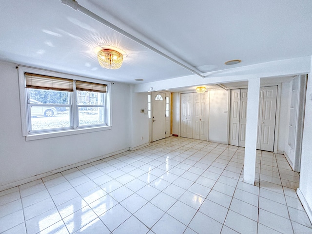 unfurnished bedroom featuring two closets