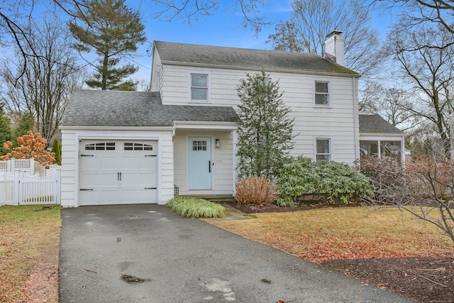 front of property with a garage