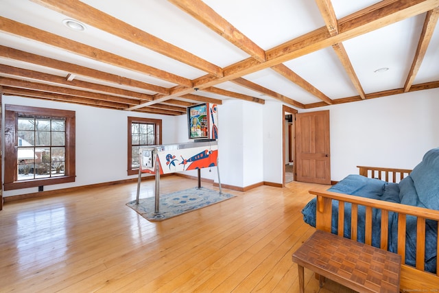 interior space featuring light hardwood / wood-style floors and beam ceiling