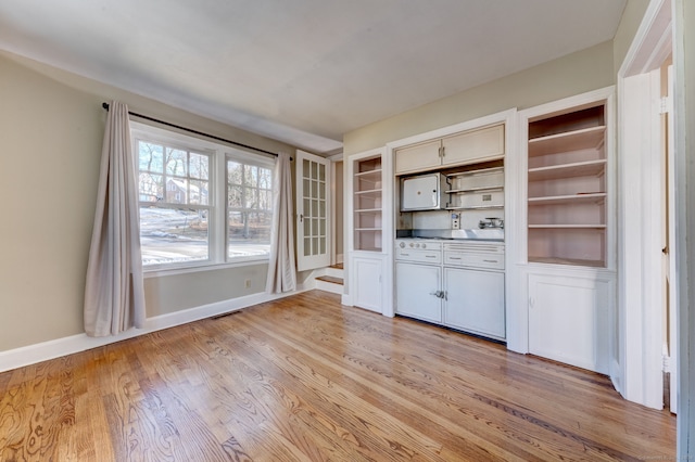 kitchen with light hardwood / wood-style floors