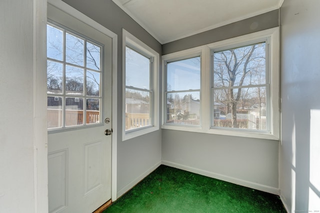 unfurnished sunroom with a wealth of natural light