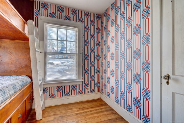 bedroom featuring wood-type flooring