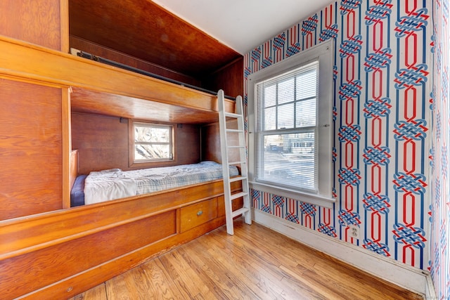 bedroom with hardwood / wood-style flooring